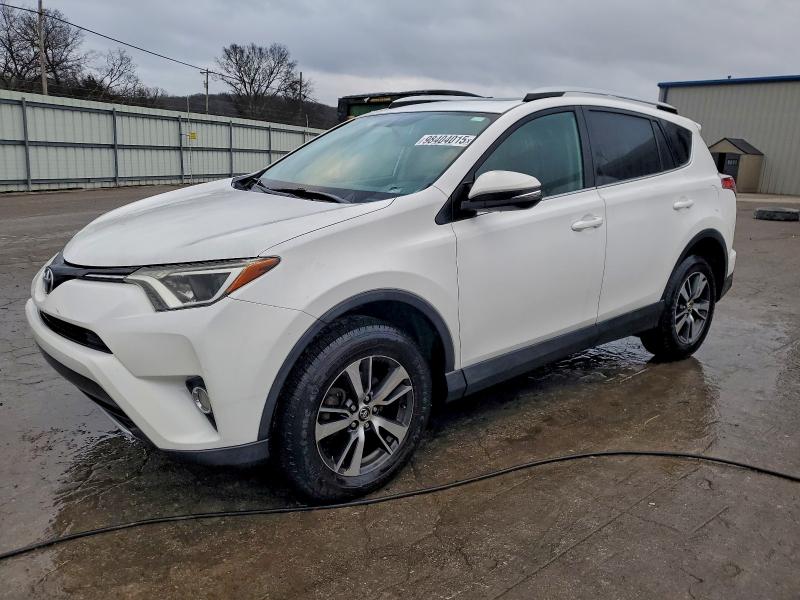 TOYOTA RAV4 XLE 2016 with VIN 2T3WFREV7GW277171 - Photo from auction