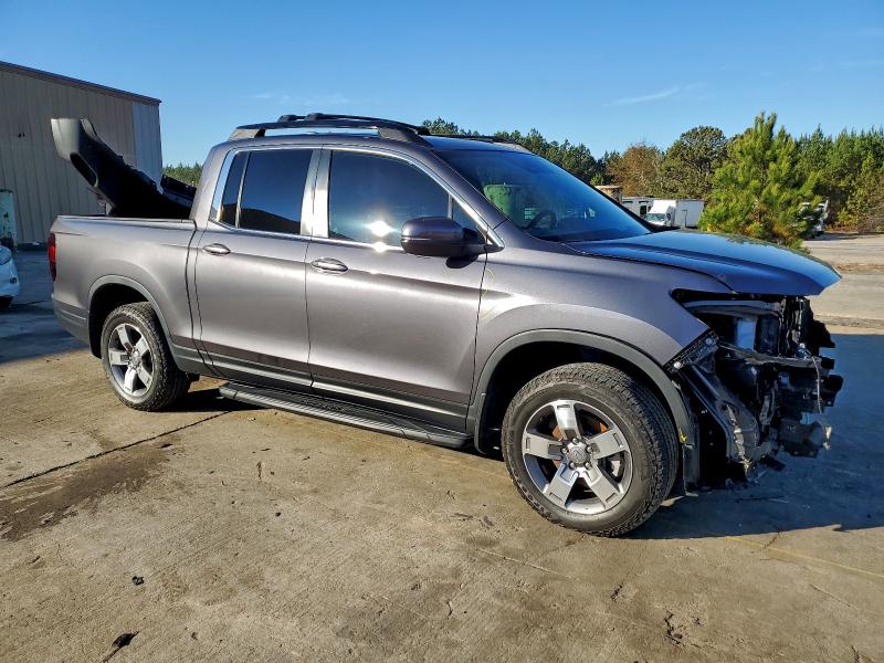 Photo 4 from auction – 2024 HONDA RIDGELINE with VIN 5FPYK3F51RB009149