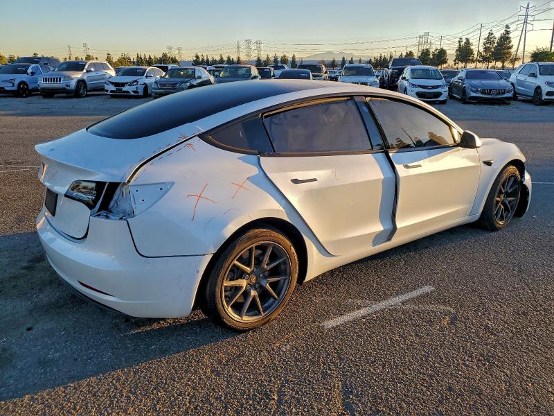 Photo 3 from auction – 2021 TESLA MODEL 3 with VIN 5YJ3E1EA2MF874086