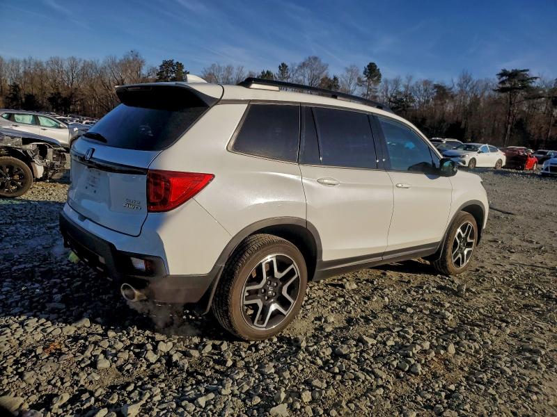 Photo 3 from auction – 2022 HONDA PASSPORT E with VIN 5FNYF8H0XNB010614