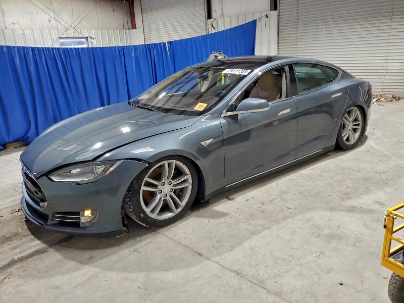 TESLA MODEL S 2012 with VIN 5YJSA1CN0CFP03106 - Photo from auction