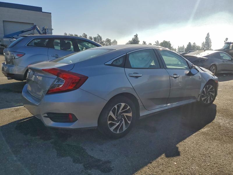 Photo 3 from auction – 2016 HONDA CIVIC EX with VIN 2HGFC2F77GH552443