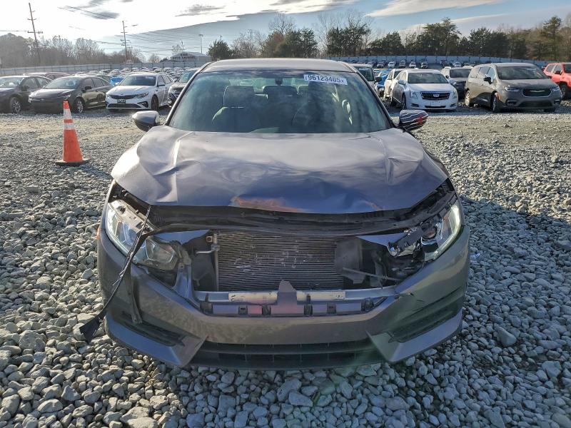 Photo 5 from auction – 2017 HONDA CIVIC LX with VIN 2HGFC2F56HH524570
