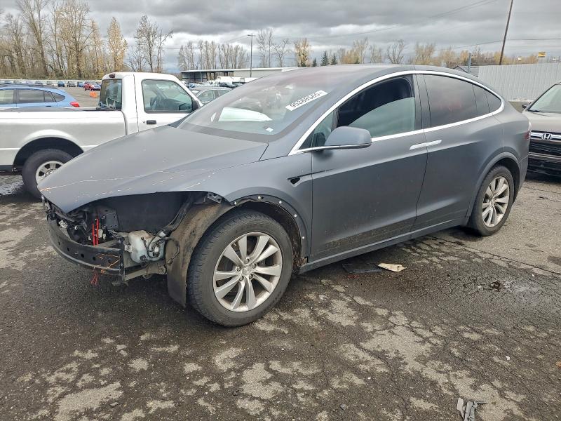 TESLA MODEL X 2016 with VIN 5YJXCBE21GF011967 - Photo from auction