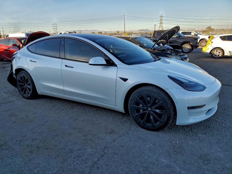 Photo 4 from auction – 2022 TESLA MODEL 3 with VIN 5YJ3E1EA5NF297197
