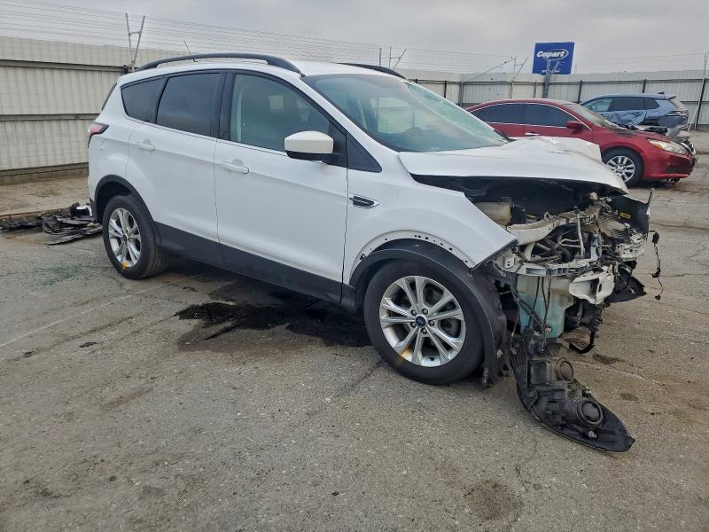 Photo 4 from auction – 2018 FORD ESCAPE SE with VIN 1FMCU0GD5JUC57977