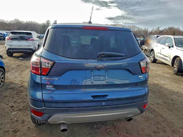 Photo 6 from auction – 2018 FORD ESCAPE SE with VIN 1FMCU9GD0JUA14453