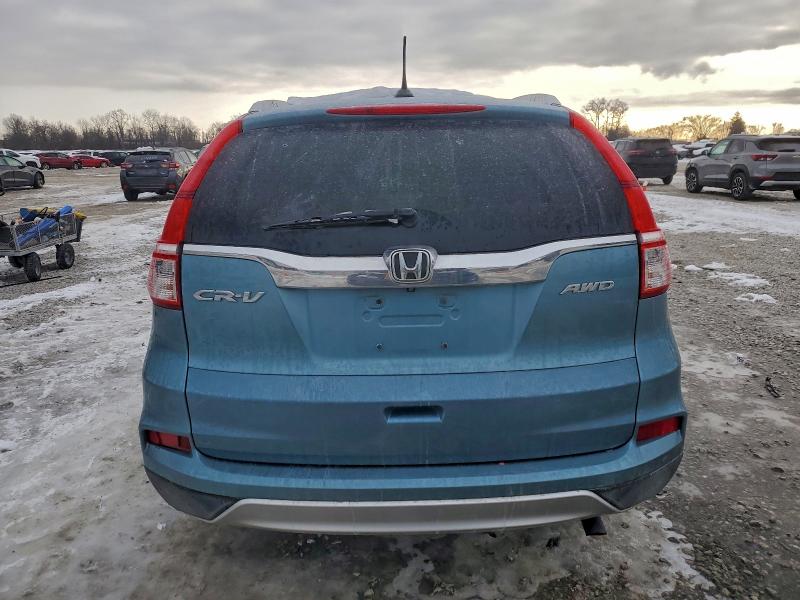 Photo 6 from auction – 2015 HONDA CR-V EXL with VIN 2HKRM4H77FH670368