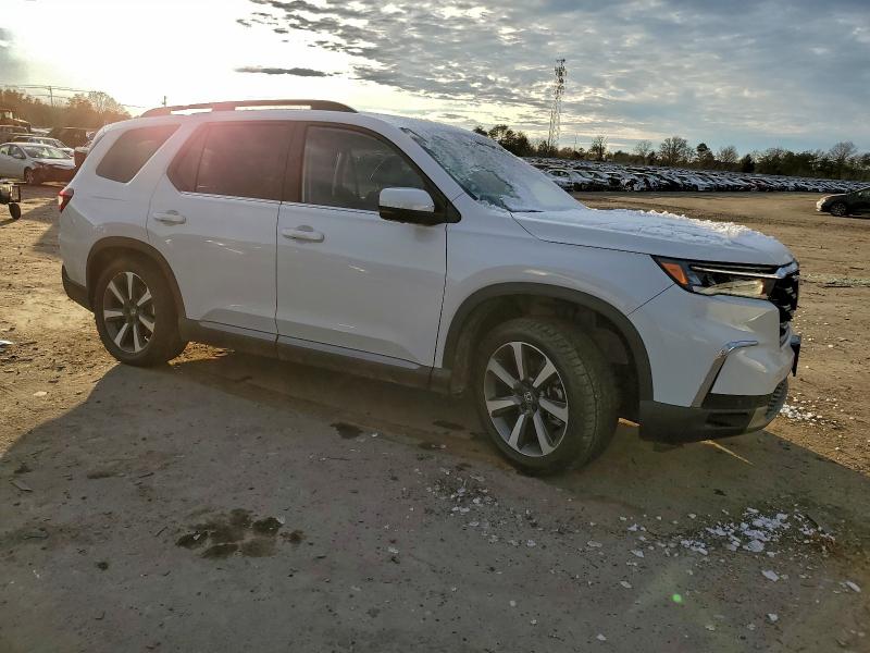 Photo 4 from auction – 2023 HONDA PILOT ELIT with VIN 5FNYG1H80PB014216