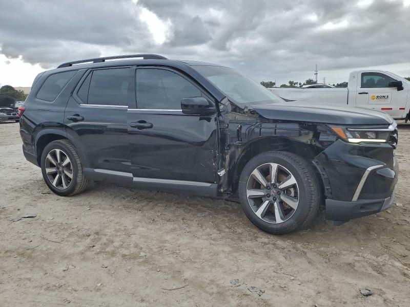 Photo 4 from auction – 2023 HONDA PILOT TOUR with VIN 5FNYG2H7XPB003334