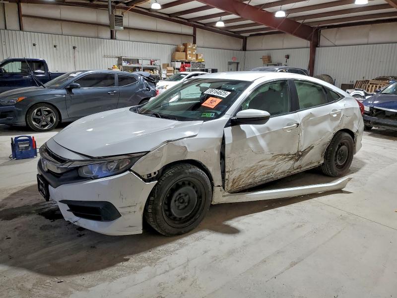 HONDA CIVIC LX 2016 with VIN 2HGFC2F51GH573352 - Photo from auction