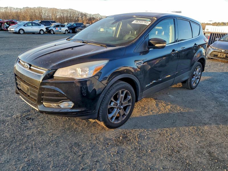 FORD ESCAPE 2013 with VIN 1FMCU9HX5DUD72080 - Photo from auction