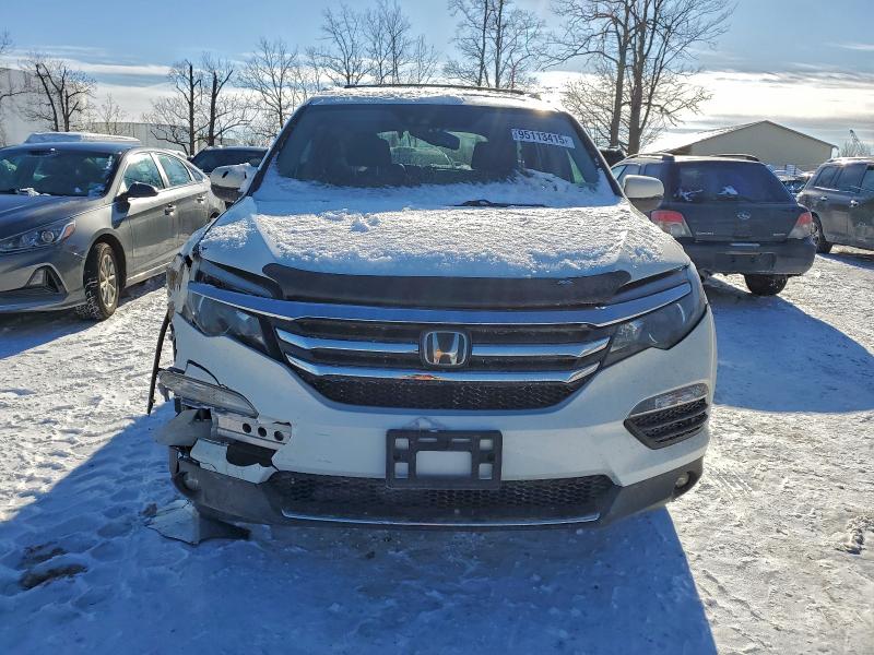 Photo 5 from auction – 2016 HONDA PILOT ELIT with VIN 5FNYF6H07GB070504