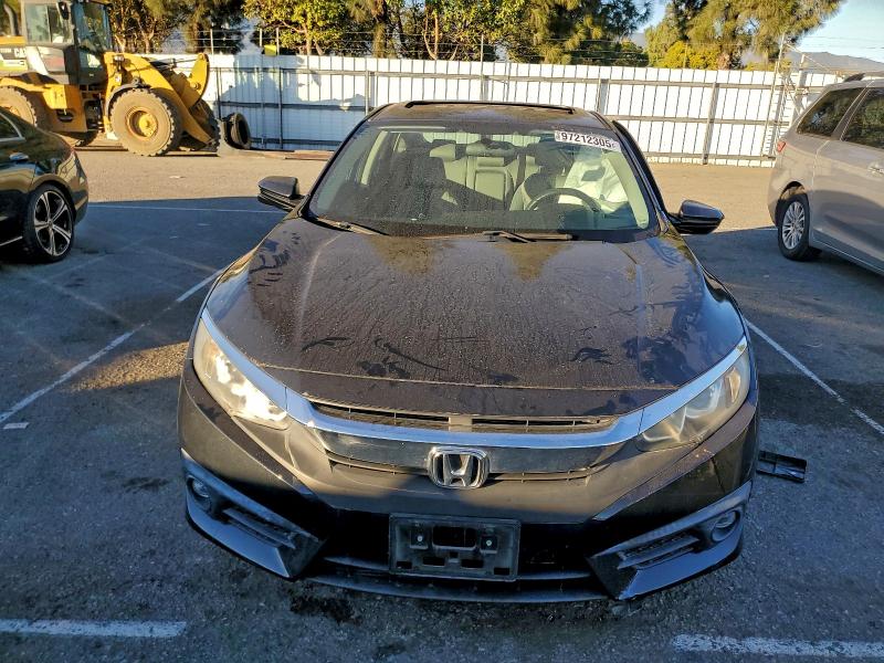 Photo 5 from auction – 2017 HONDA CIVIC EX with VIN 2HGFC1F35HH634261