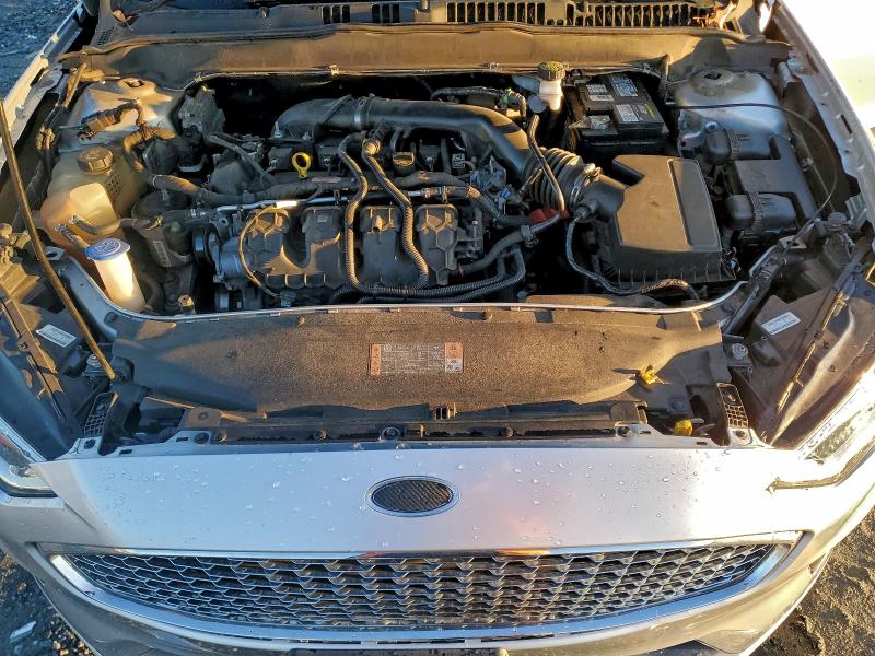 Photo 11 from auction – 2019 FORD FUSION TIT with VIN 3FA6P0D94KR124277