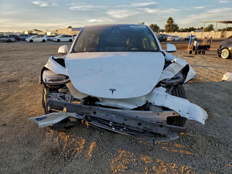 Photo 5 from auction – 2021 TESLA MODEL Y with VIN 5YJYGDED1MF125923