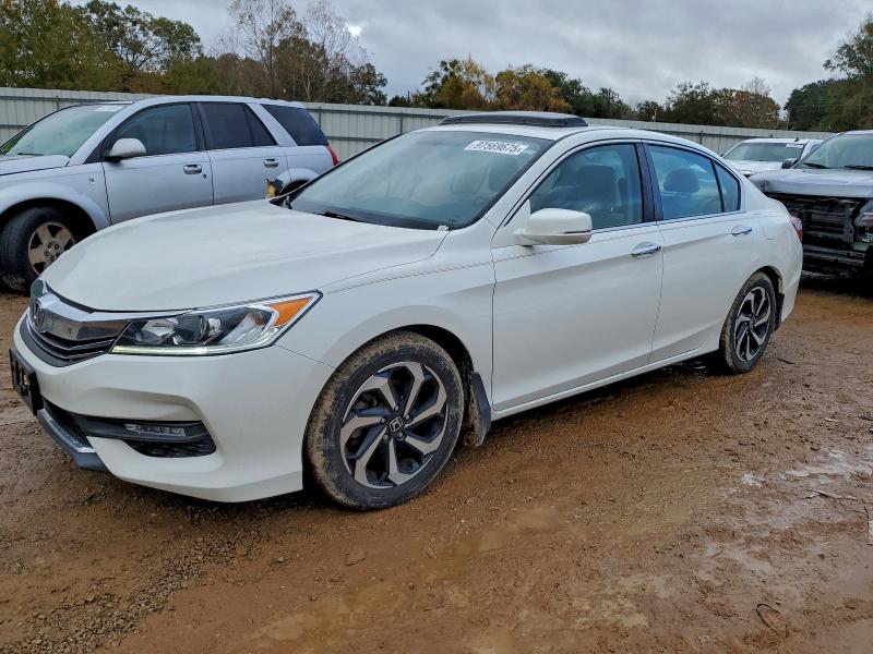 HONDA ACCORD 2016 with VIN 1HGCR2F77GA125084 - Photo from auction