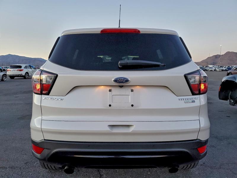 Photo 6 from auction – 2017 FORD ESCAPE TIT with VIN 1FMCU9JD5HUC88203