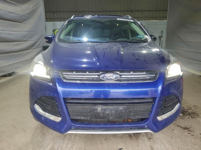 Photo 5 from auction – 2015 FORD ESCAPE TIT with VIN 1FMCU9J95FUA85935