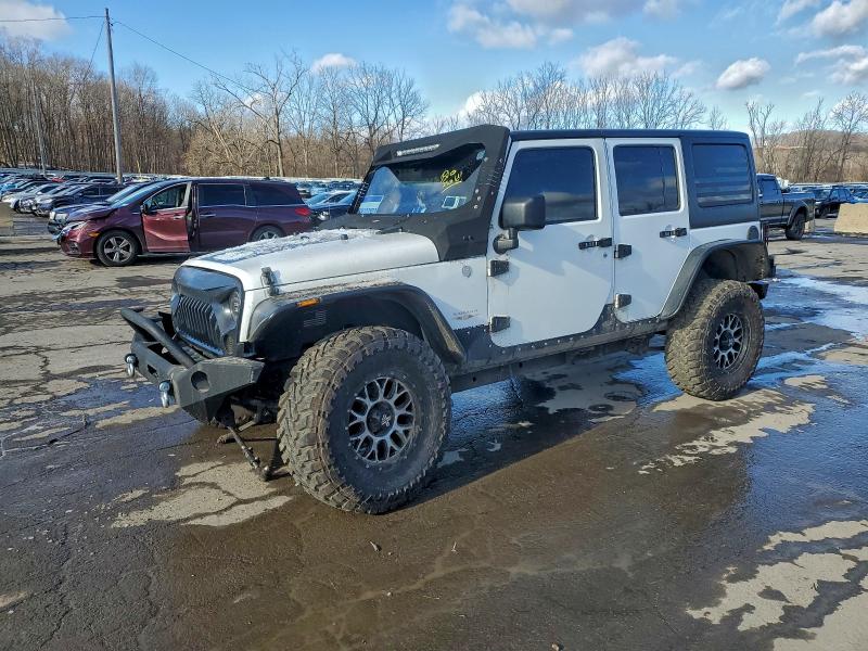 JEEP WRANGLER U 2012 with VIN 1C4BJWEG9CL125645 - Photo from auction