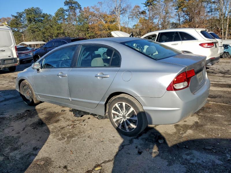 Photo 2 from auction – 2011 HONDA CIVIC LX with VIN 19XFA1F56BE034485