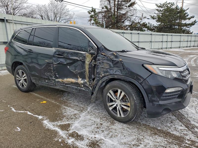 Photo 4 from auction – 2018 HONDA PILOT EXL with VIN 5FNYF6H52JB018345