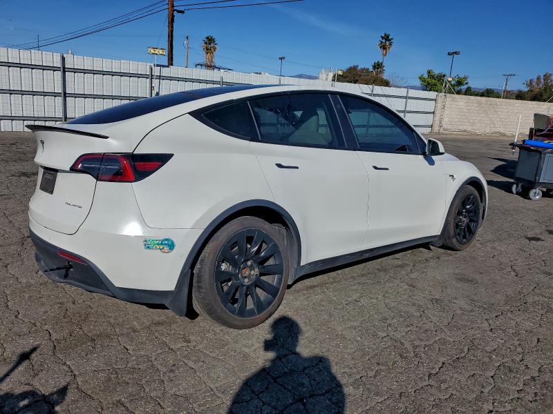 Photo 3 from auction – 2021 TESLA MODEL Y with VIN 5YJYGAEE0MF270667