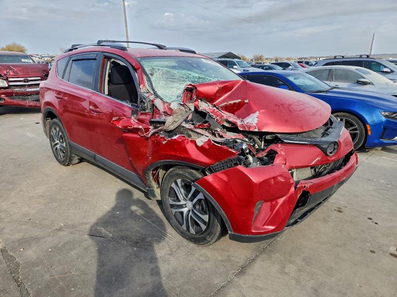 Photo 4 from auction – 2017 TOYOTA RAV4 with VIN JTMZFREV5HJ128058