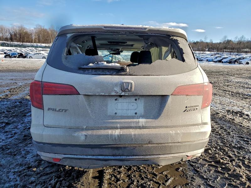 Photo 6 from auction – 2017 HONDA PILOT TOUR with VIN 5FNYF6H94HB064689