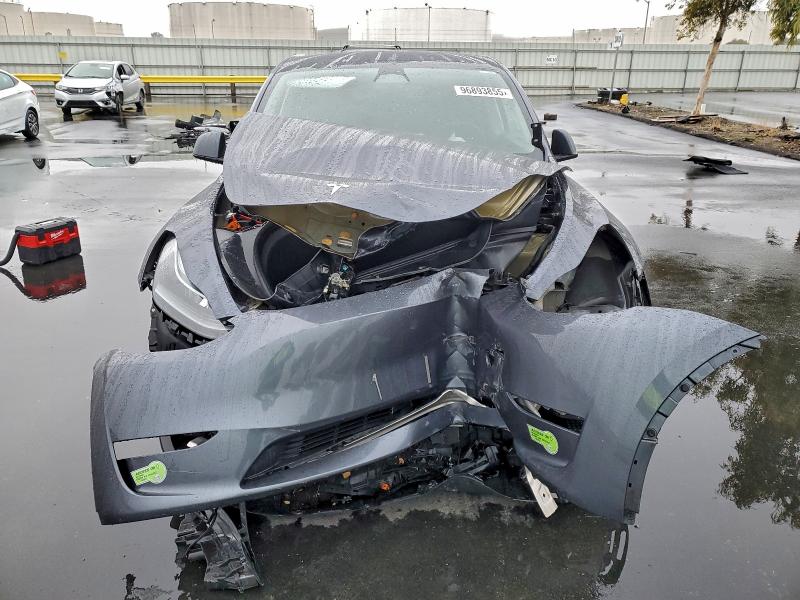 Photo 5 from auction – 2023 TESLA MODEL Y with VIN 7SAYGDEE1PF634202