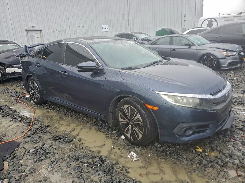 Photo 4 from auction – 2016 HONDA CIVIC with VIN 19XFC1F75GE016482