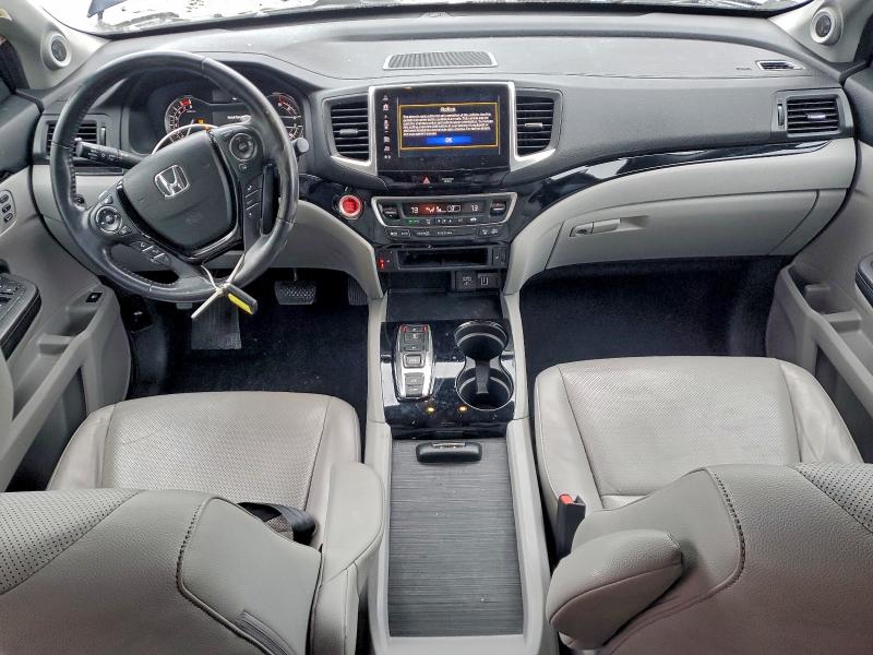 Photo 8 from auction – 2020 HONDA RIDGELINE with VIN 5FPYK3F74LB023619