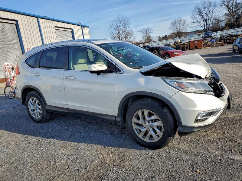 Photo 4 from auction – 2016 HONDA CR-V EXL with VIN 5J6RM4H70GL033376
