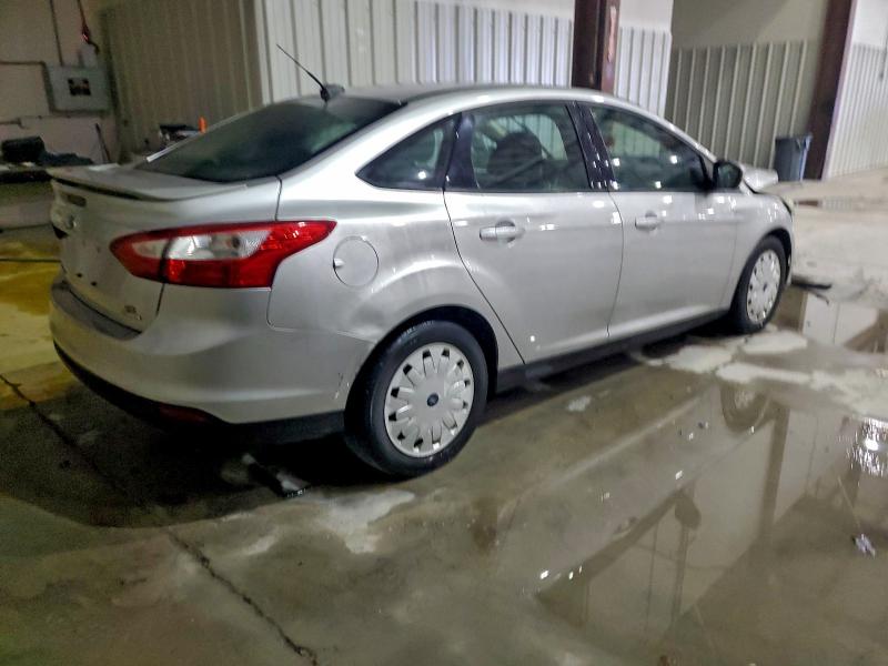 Foto 3 de la subasta – 2013 FORD FOCUS SE con VIN 1FADP3F20DL276177