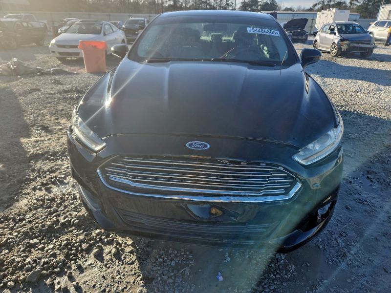 Photo 5 from auction – 2016 FORD FUSION S with VIN 3FA6P0G73GR327131