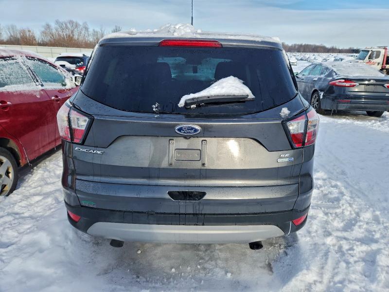 Photo 6 from auction – 2017 FORD ESCAPE SE with VIN 1FMCU9GDXHUC38260
