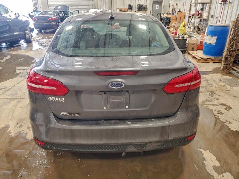 Photo 6 from auction – 2018 FORD FOCUS S with VIN 1FADP3E25JL215419