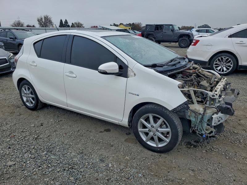 Photo 4 from auction – 2013 TOYOTA PRIUS C with VIN JTDKDTB30D1049480