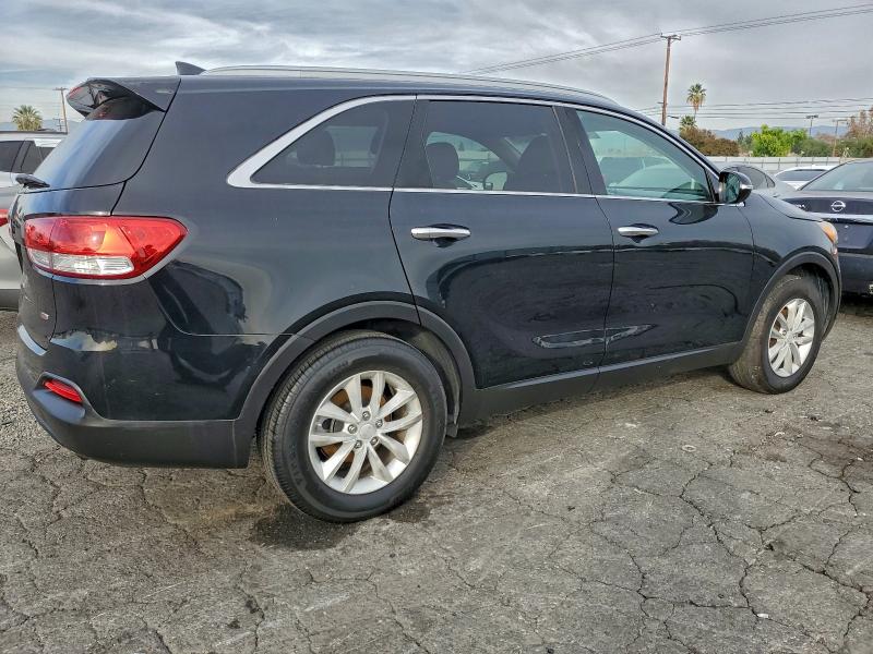 Photo 3 from auction – 2016 KIA SORENTO LX with VIN 5XYPG4A37GG062946