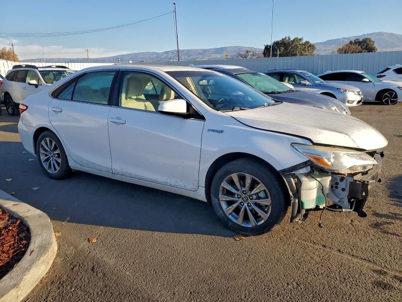 Photo 4 from auction – 2015 TOYOTA CAMRY HYBR with VIN 4T1BD1FK2FU153746