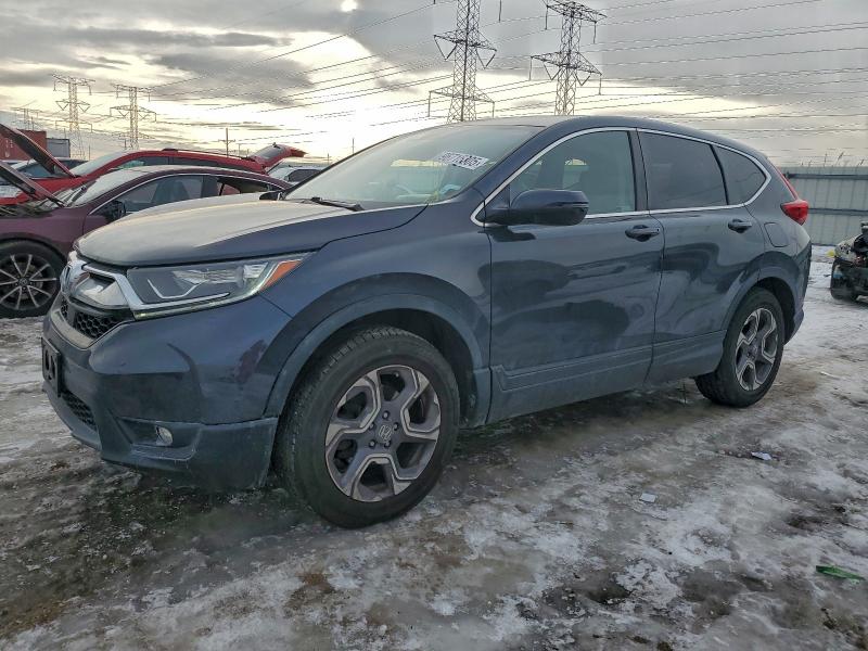 Photo 1 from auction – 2018 HONDA CR-V EX with VIN 7FARW2H51JE059471