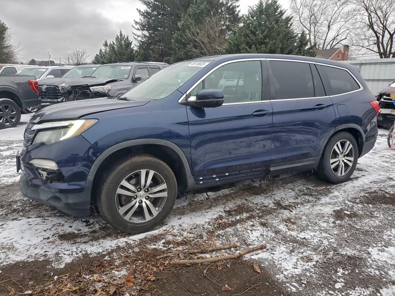 HONDA PILOT 2017 with VIN 5FNYF5H30HB029556 - Photo from auction