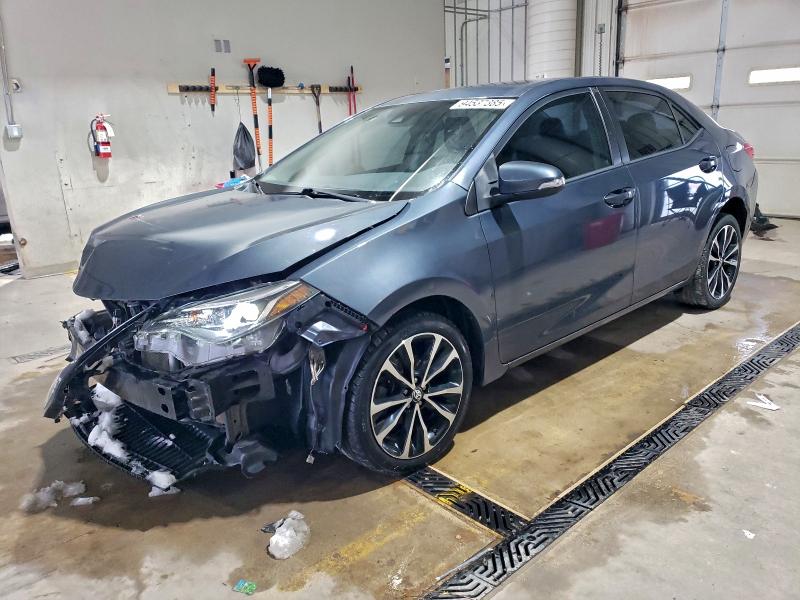 TOYOTA COROLLA 2018 with VIN 5YFBURHEXJP833071 - Photo from auction