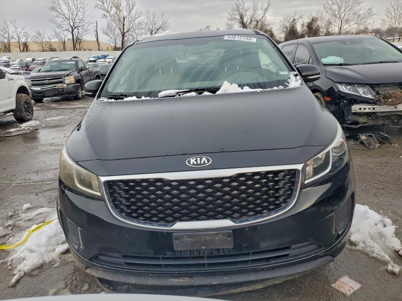 Photo 5 from auction – 2015 KIA SEDONA LX with VIN KNDMB5C10F6041117