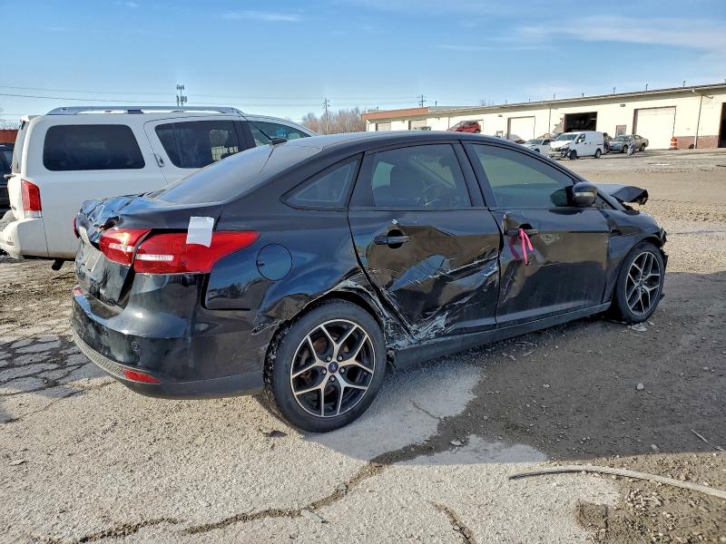 Photo 3 from auction – 2017 FORD FOCUS SEL with VIN 1FADP3H25HL342953