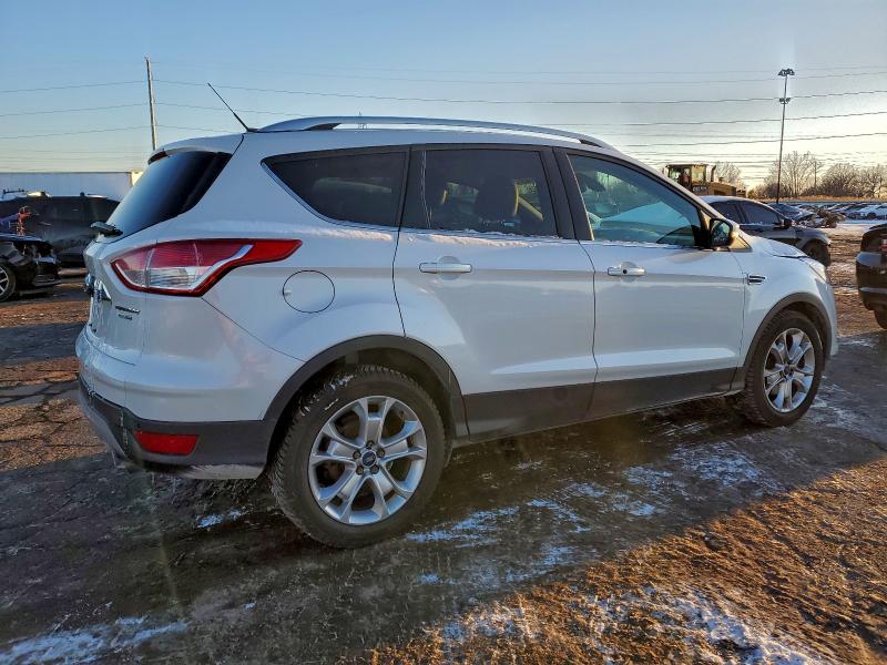 Photo 3 from auction – 2016 FORD ESCAPE TIT with VIN 1FMCU9JXXGUA19915