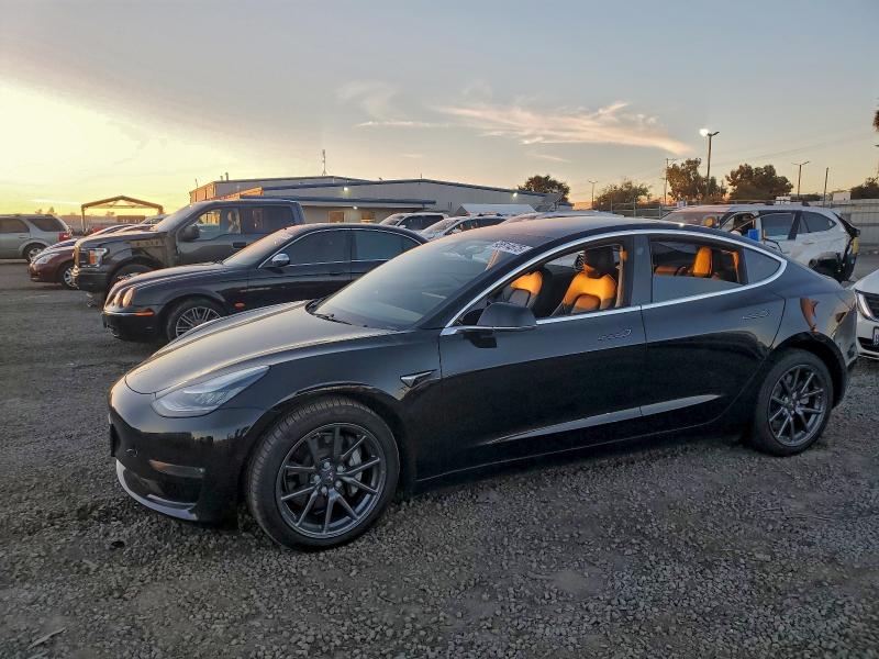 TESLA MODEL 3 2018 with VIN 5YJ3E1EB8JF144476 - Photo from auction