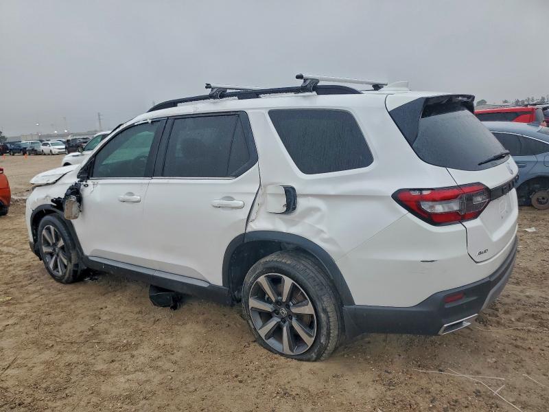 Photo 2 from auction – 2023 HONDA PILOT ELIT with VIN 5FNYG1H84PB025462
