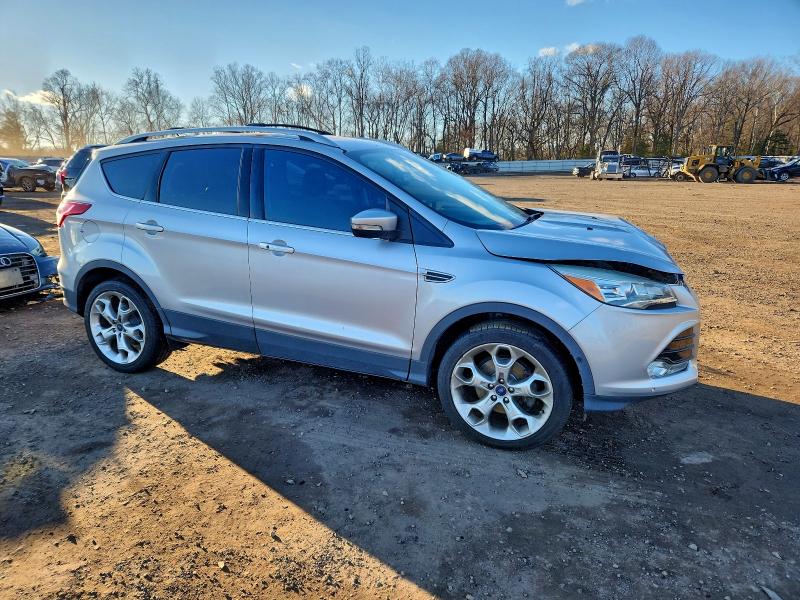 Photo 4 from auction – 2016 FORD ESCAPE TIT with VIN 1FMCU9J9XGUB90536