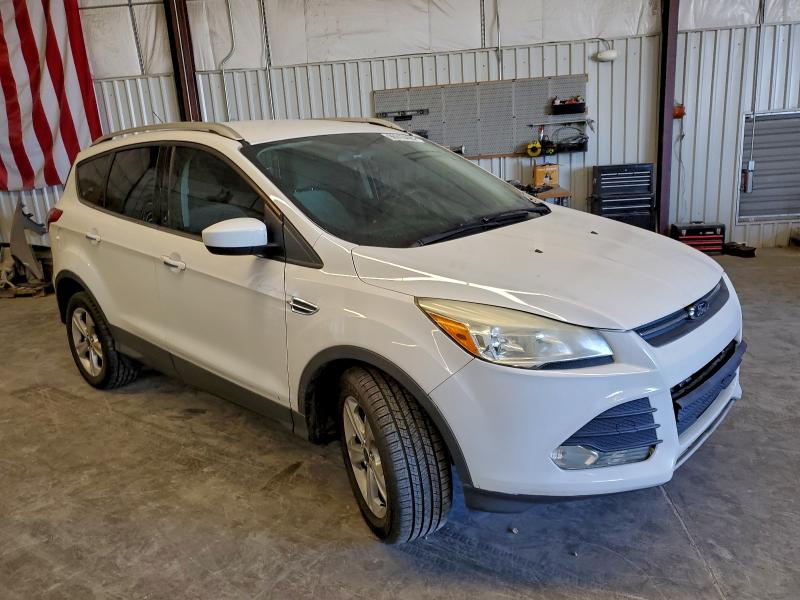 Photo 4 from auction – 2014 FORD ESCAPE SE with VIN 1FMCU9GXXEUD59571